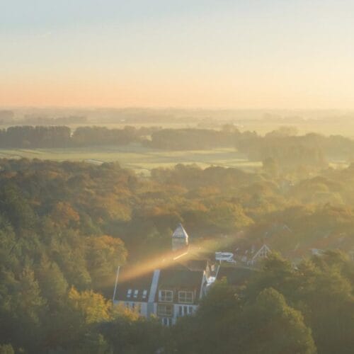 Autumn sunrise over the woods and fields around Blooming, Bergen