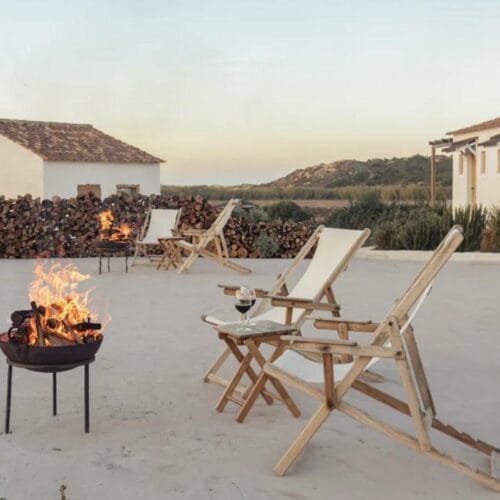 Evening fires in the courtyard at Hortas do Rio