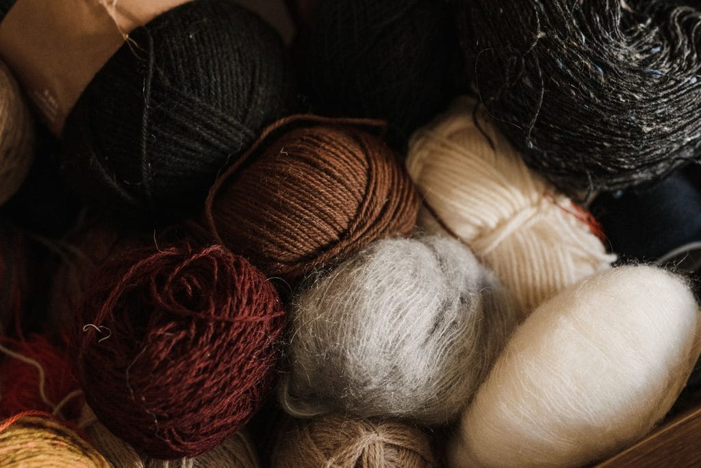 Undyed wool in natural cream and rust tones